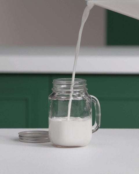 Froth milk with a Mason jar
