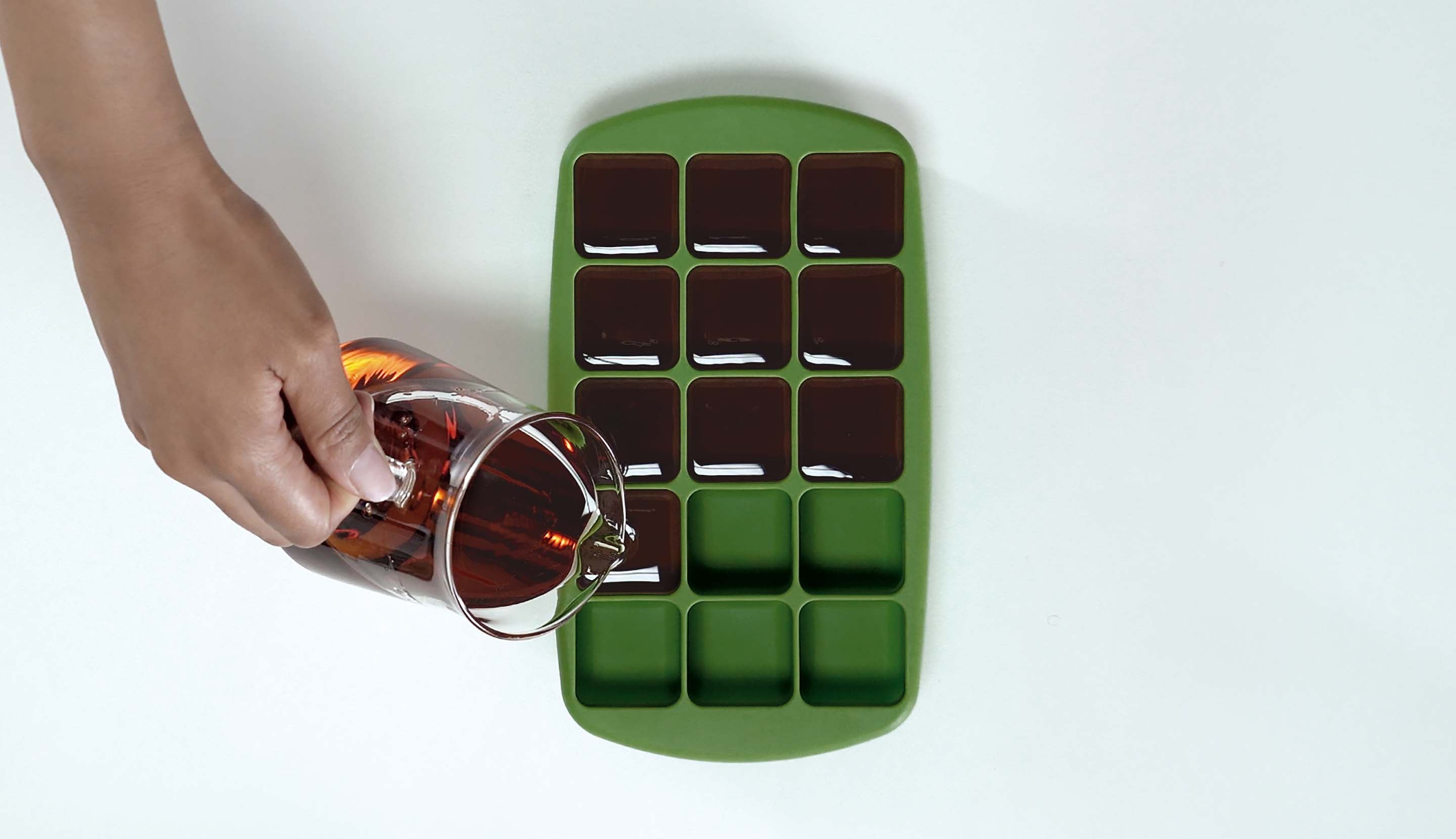 Pouring Coffee on Ice tray