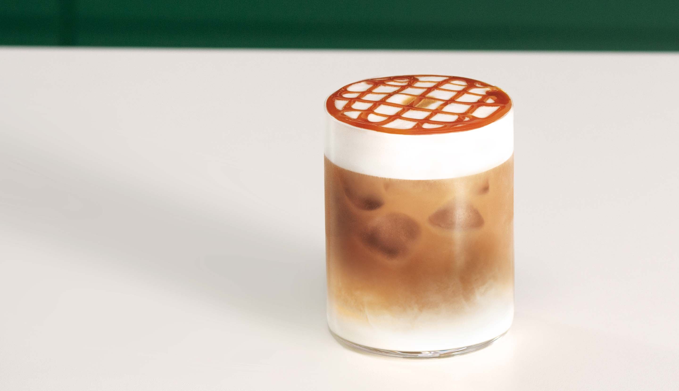 Caramel Drizzle on Coffee Latte Cup