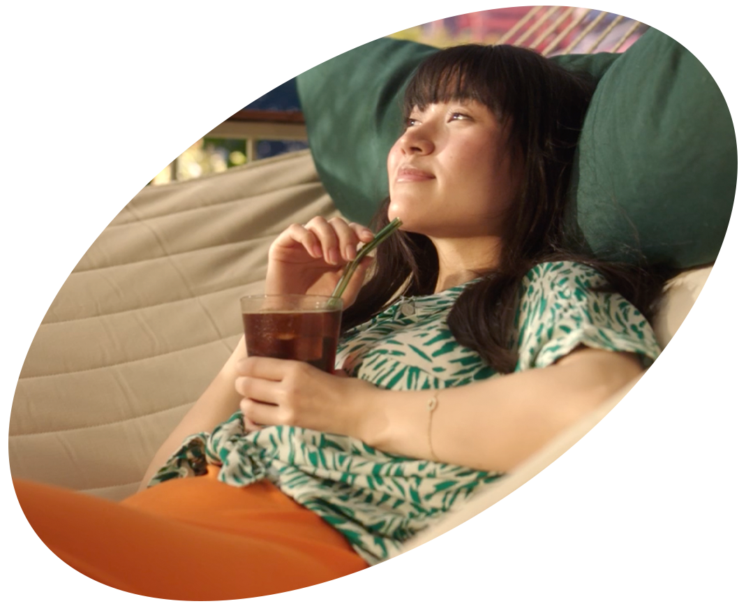 woman drinks iced coffee