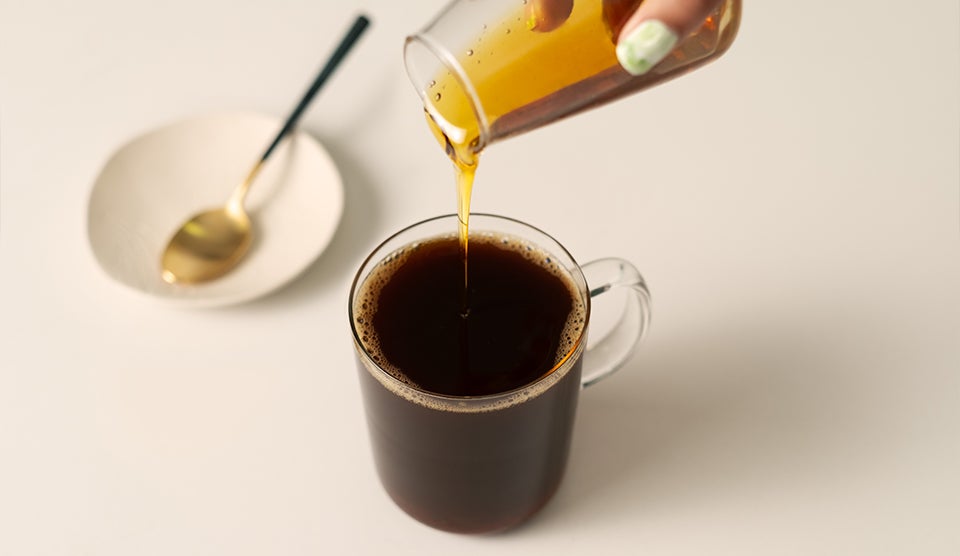 Syrups being added to coffee