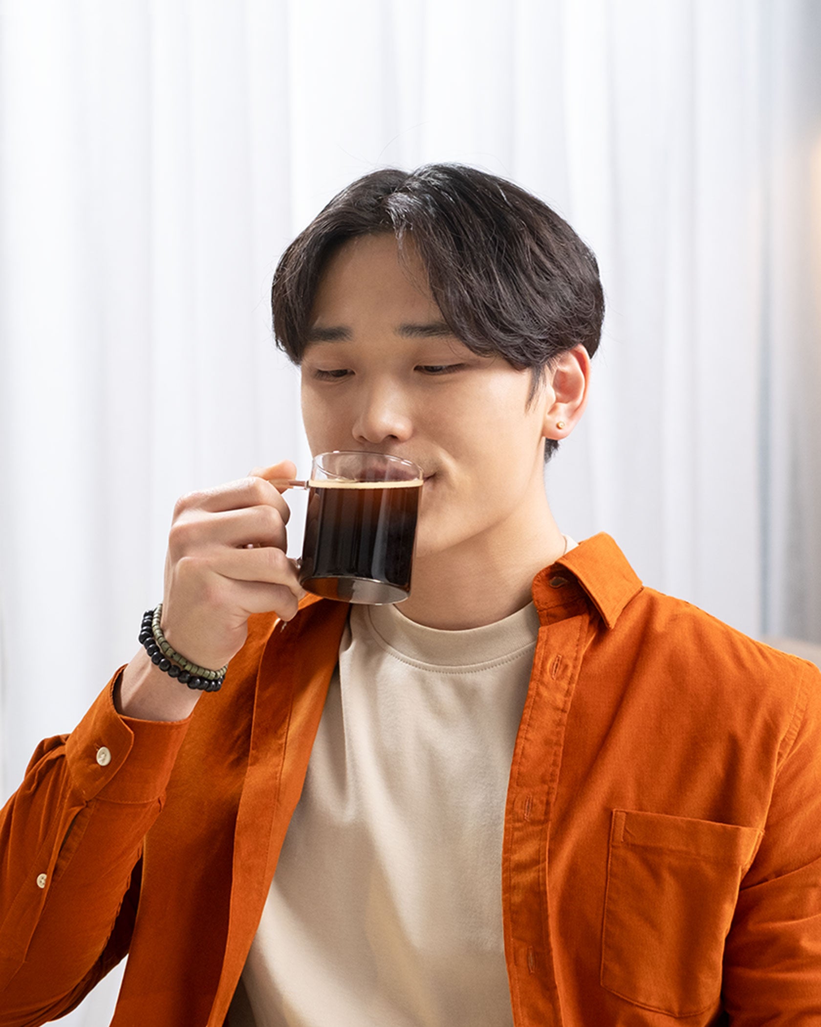 Man making Starbucks® Premium Instant Medium Roast