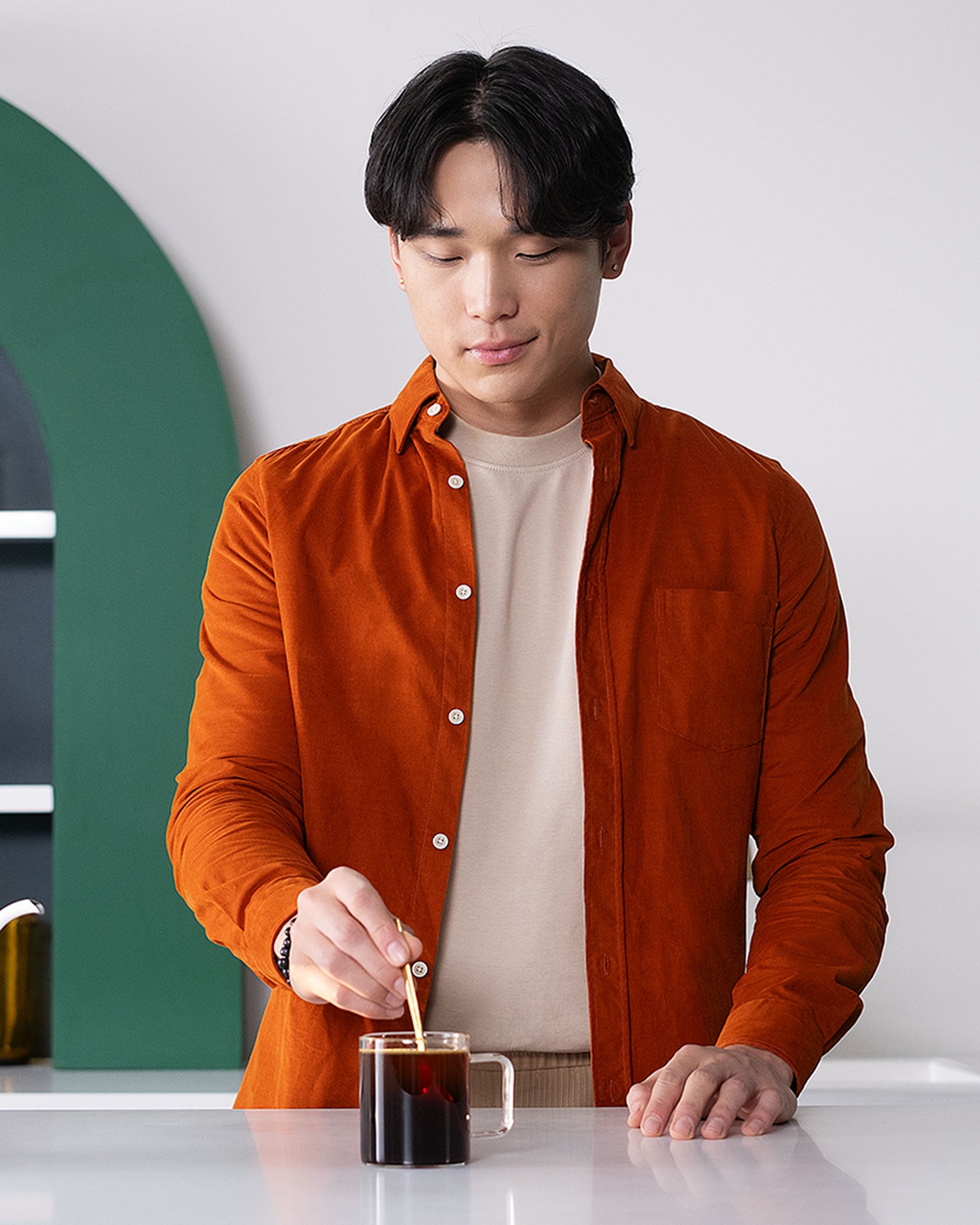 Man making Starbucks® Premium Instant Dark Roast