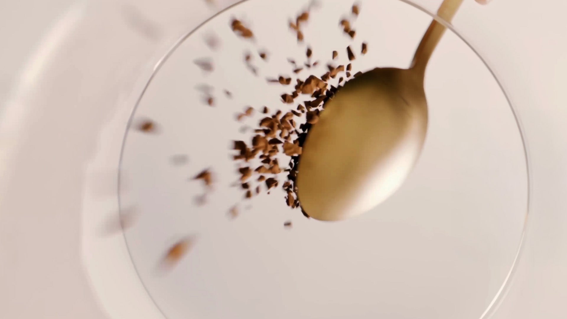 Soluble coffee being poured into a glass
