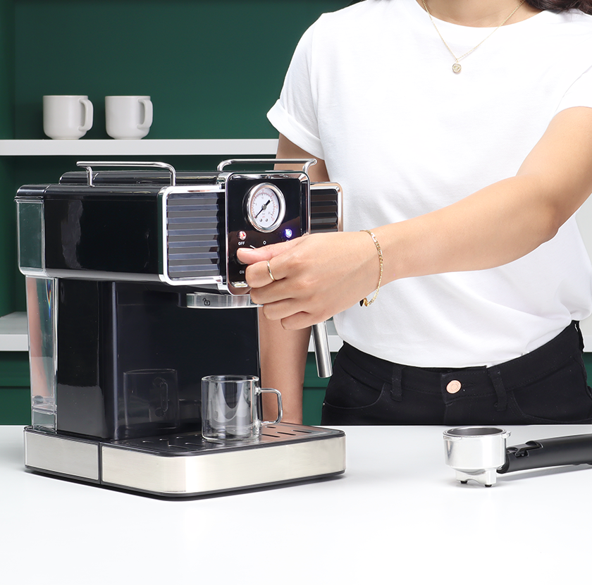 Turn on your espresso machine to preheat it.