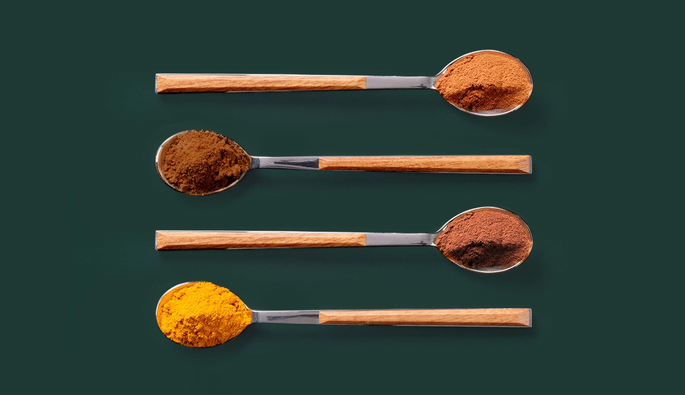 Selection of spices and powders for customising Starbucks® iced coffee.