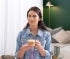 Woman enjoying Starbucks® Cappuccino Premium Instant Coffee