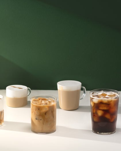Five different cold coffees standing on the table